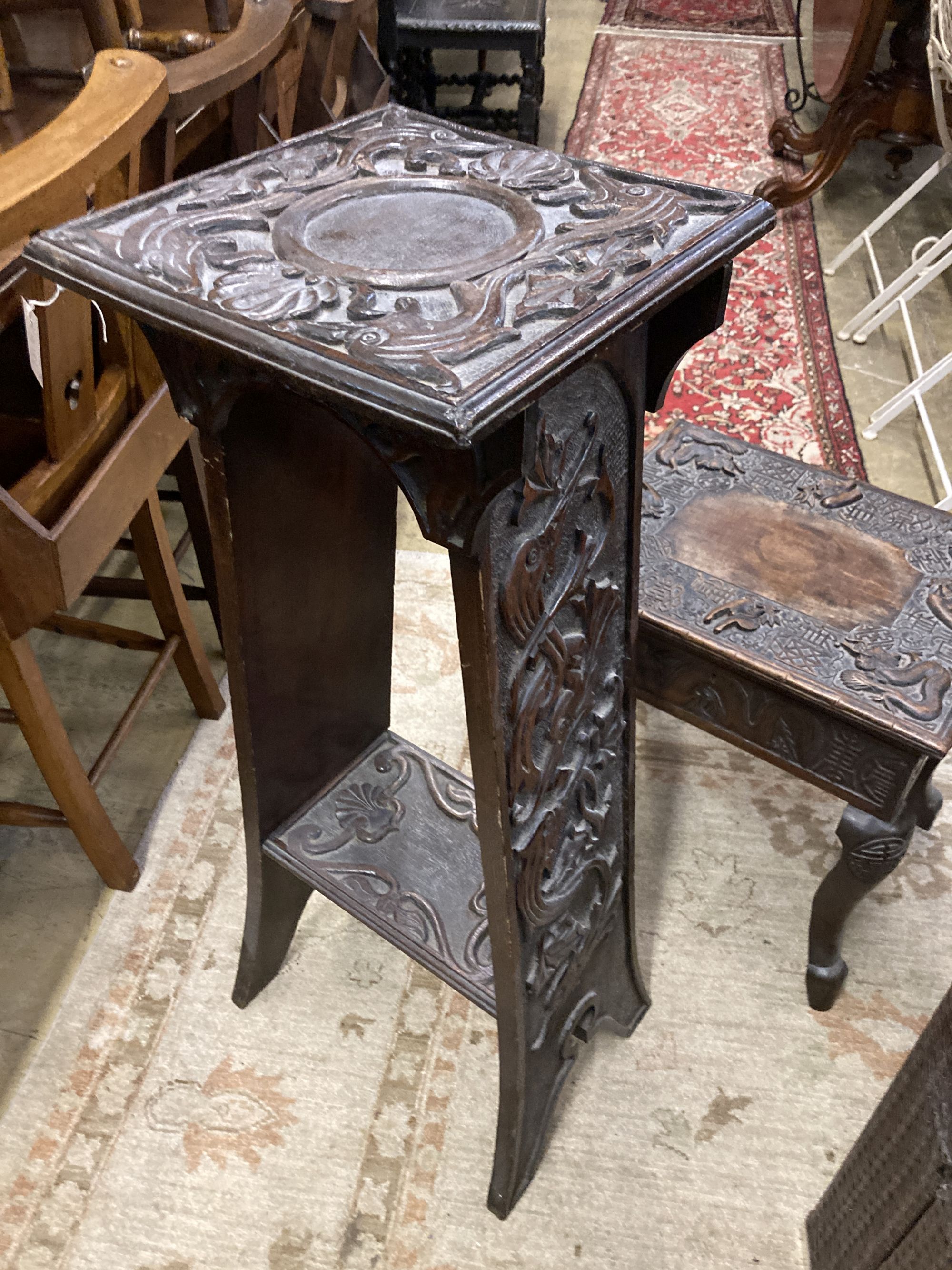 A Burmese carved box seat stool, width 44cm, depth 34cm, height 45cm and a similar two tier plant stand